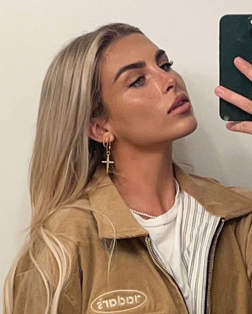Babe @paigelorenze wearing our must have Gold Cross Hoops 🤎✨ #LuvAjBabe
