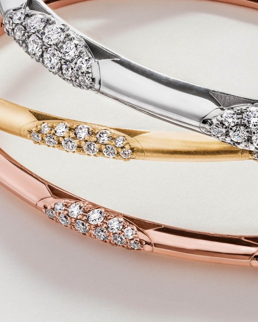 The TACORI Crescent is our iconic design element. You'll find it on the reverse of your studs earrings, and on the inner face of your wedding band, and adding sparkle to your #CrescentEclipse bangle.

Featured Styles:
Rose Gold Bangle FB668PK-M
Yellow Gold Bangle FB668Y
White Gold Bangle FB670-M

#TACORI