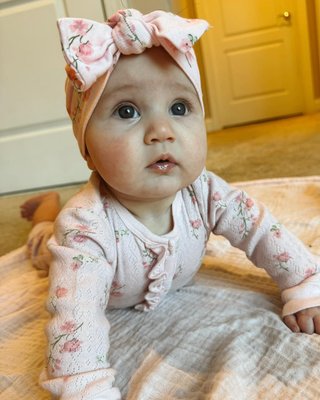 I have a 5 month old… 🥹🌸✨ #5monthsold #gerberbaby #babygirl #cute #baby #daughter #gerberchildrenswear #rolypoly
