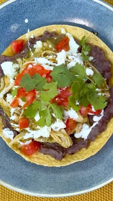 Get Tostada Tuesday ready with Knorr Chicken Chile Verde Tostadas featuring the tried and true knorr Chicken Bouillon. This recipe comes together in 30 minutes and will be a family favorite everyone will enjoy. 

#KnorrPartner #knorrTasteCombos #recipe 

Knorr Chicken Chile Verde Tostadas:
* 2 poblano peppers
* 2 anaheim chiles
* 2 jalapenos
* 10 tomatillos, husks removed and cut in half
* 5 garlic cloves
* ½ cup cilantro 
* 6 black peppercorns 
* ¾ cup hot water
* 2 tablespoons Knorr Chicken Bouillon, divided
* 2 tablespoons vegetable oil
* 2 lbs. chicken thighs
* 1 onion, sliced 
* Tostadas
* Cilantro
* 1 cup Black beans 
* Queso fresco 
Roast chiles on an open flame, until charred. Place in an airtight container for 30 minutes to steam. Scrape charred skin from chile and remove stem. 
Place chiles, tomatillos, garlic, cilantro, peppercorns, water and 1 tablespoon Knorr Chicken Bouillon to a blender. 
Blend until smooth. Set to the side. 
Sprinkle chicken with 1 heaping tablespoon of Kno