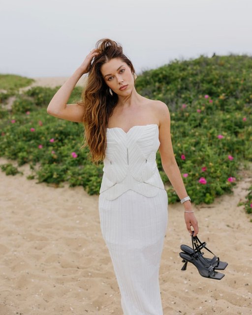 Sun-soaked styles for your next beach escape 🌊 Shop new arrivals from Cult Gaia with the link in bio and 20% of net proceeds supports @careorg 🤍