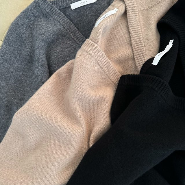 New colors available in our classic v neck sweater with a modern oversized fit #fw24 #alminaconcept