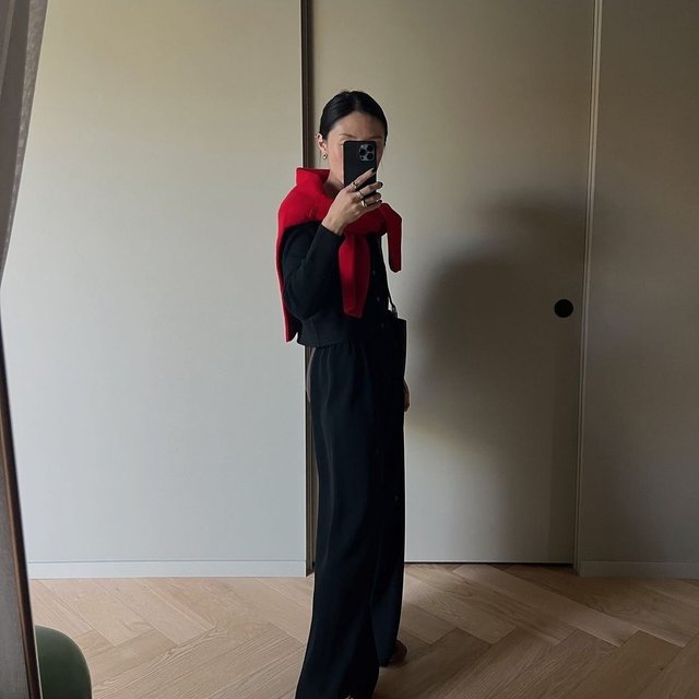 A pop of red @sophiachang layering our new red wool v neck sweater