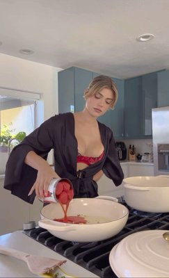 @fatherkels cooking up something tasty in our Pomodoro Embroidery Demi Bra & Angel Sleeve Robe 🍅✨