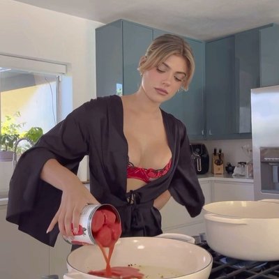 @fatherkels cooking up something tasty in our Pomodoro Embroidery Demi Bra & Angel Sleeve Robe 🍅✨