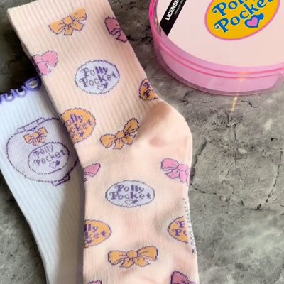 Image 407: Soft, comfy, and oh-so-cute! 🎀
typoshop #pollypocket #socks #noveltysocks
©2024 MATTEL